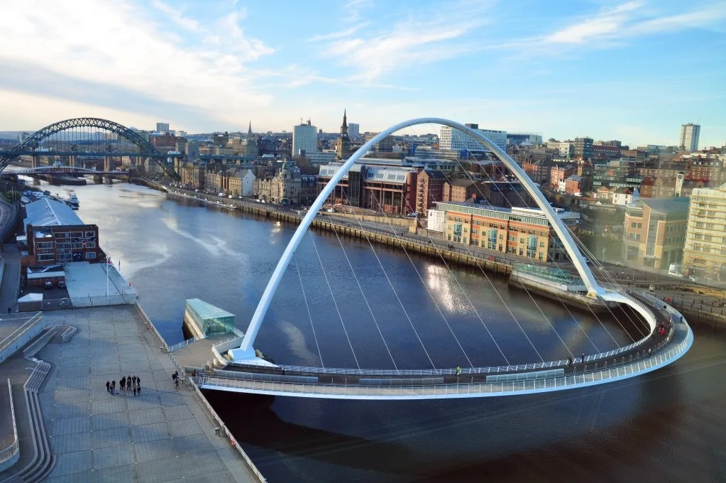 The Tyne Bridge, the Gateshead Millennium Bridge and the skyline of Newcastle upon Tyne.